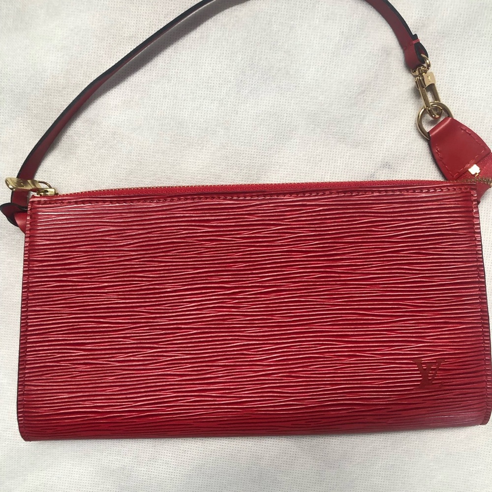 Louis Vuitton Red Epi leather pouchette. Excellent condition.